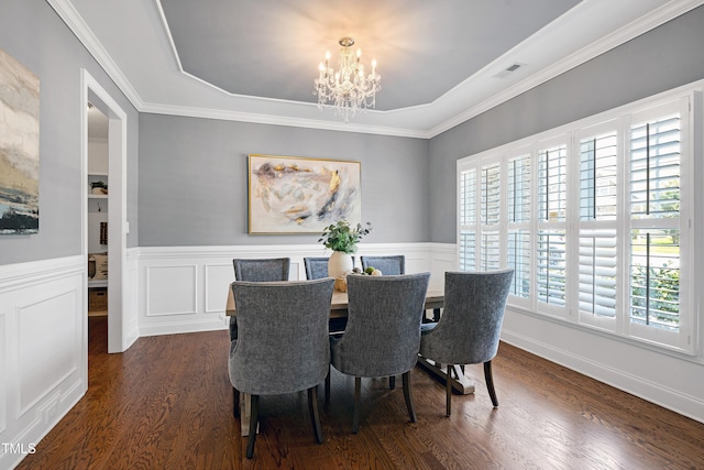 837 Varina Ln, Fuquay Varina, NC 27526 - dining room featuring a chandelier, dark wood-style floors, wainscoting, a tray ceiling, and ornamental molding