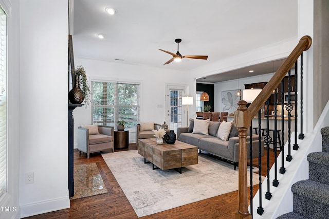 837 Varina Ln, Fuquay Varina, NC 27526 - living room featuring wood finished floors, stairway, a ceiling fan, and recessed lighting