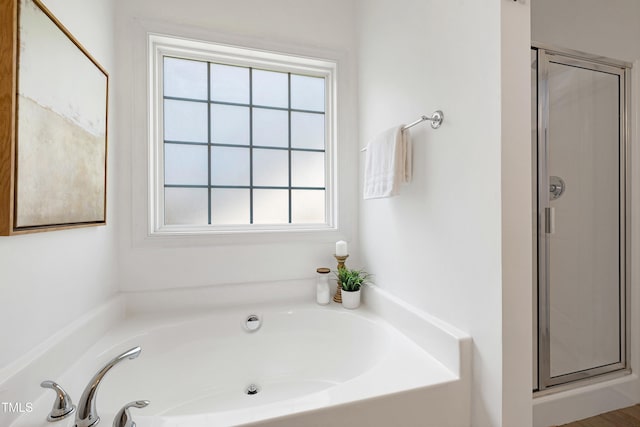 837 Varina Ln, Fuquay Varina, NC 27526 - bathroom featuring a shower stall and a garden tub