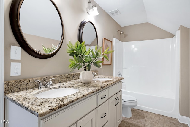 837 Varina Ln, Fuquay Varina, NC 27526 - full bathroom featuring double vanity,  shower combination, and vaulted ceiling