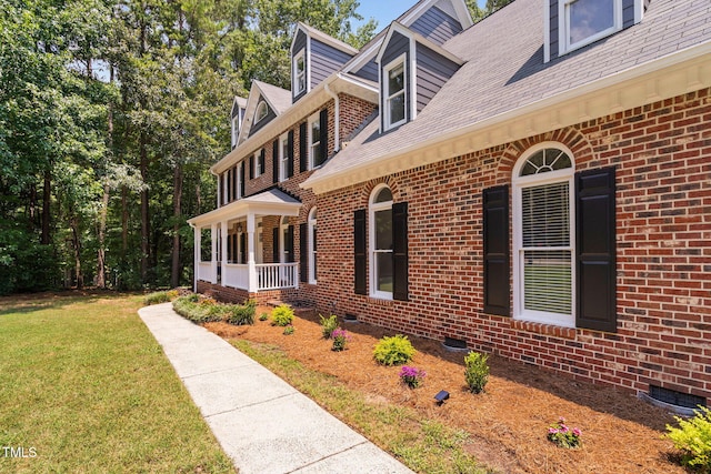 13004 Hanford Ct, Raleigh, NC 27614 - view of side of property featuring crawl space, a lawn, brick siding, a porch, and roof with shingles