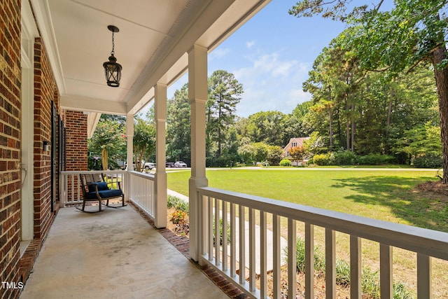 13004 Hanford Ct, Raleigh, NC 27614 - porch with a yard and view of scattered trees
