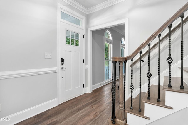 13004 Hanford Ct, Raleigh, NC 27614 - foyer featuring wood finished floors, crown molding, and stairs