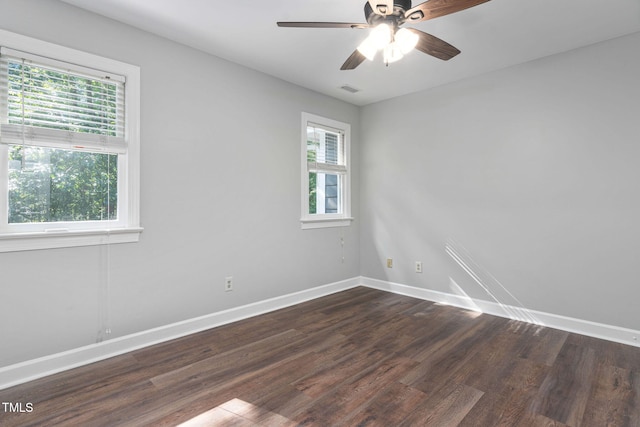13004 Hanford Ct, Raleigh, NC 27614 - unfurnished room featuring plenty of natural light, dark wood-type flooring, and a ceiling fan