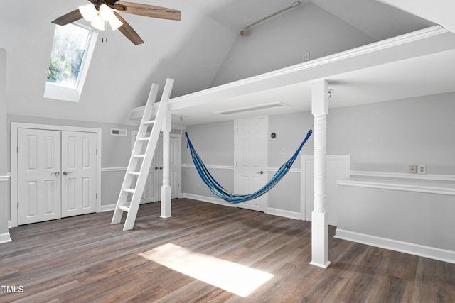 13004 Hanford Ct, Raleigh, NC 27614 - unfurnished bedroom featuring vaulted ceiling, wood finished floors, a skylight, and ceiling fan