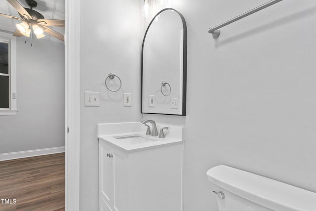 13004 Hanford Ct, Raleigh, NC 27614 - bathroom with vanity, wood finished floors, and ceiling fan
