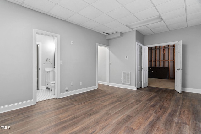 13004 Hanford Ct, Raleigh, NC 27614 - unfurnished bedroom with wood finished floors, a paneled ceiling, and ensuite bath