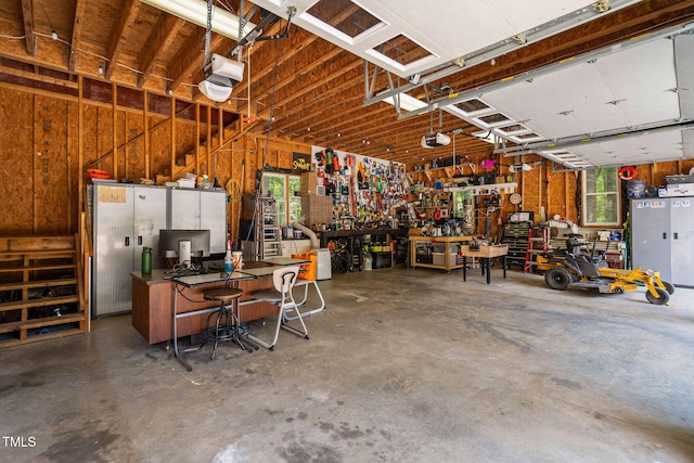 13004 Hanford Ct, Raleigh, NC 27614 - garage featuring a workshop area and a garage door opener