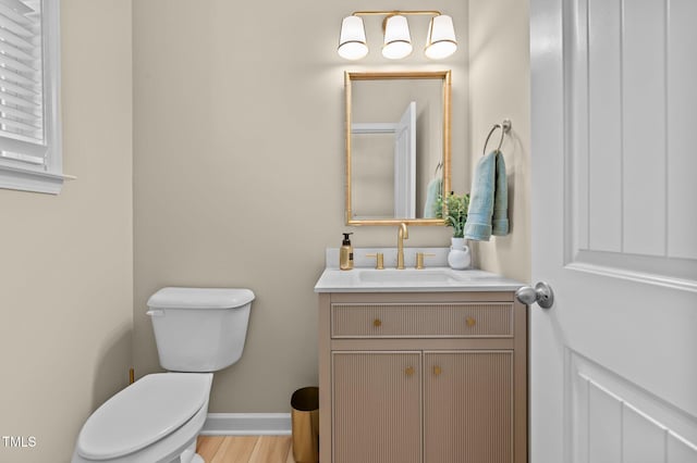 1831 Grandmaster Way, Wake Forest, NC 27587 - bathroom featuring vanity and wood finished floors