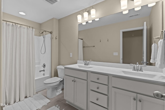 1831 Grandmaster Way, Wake Forest, NC 27587 - bathroom featuring double vanity, shower / bathtub combination with curtain, and tile patterned floors