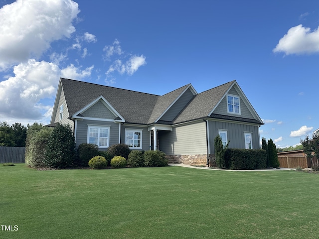 135 Meadow Lake Dr, Youngsville, NC 27596 - view of front facade with board and batten siding and a shingled roof