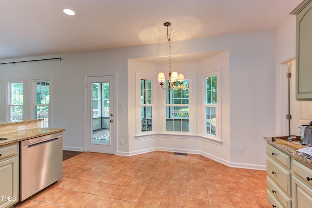 4212 Sprucedale Dr, Raleigh, NC 27613 - kitchen featuring dishwasher, a chandelier, light tile patterned floors, pendant lighting, and light stone counters