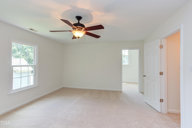 4212 Sprucedale Dr, Raleigh, NC 27613 - empty room with light carpet and a ceiling fan