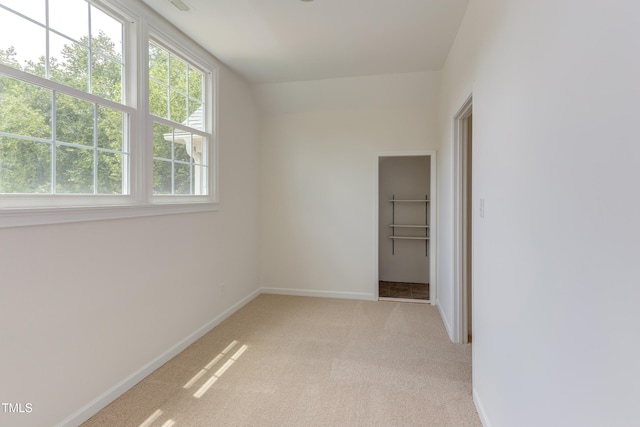 4212 Sprucedale Dr, Raleigh, NC 27613 - spare room with healthy amount of natural light and light carpet