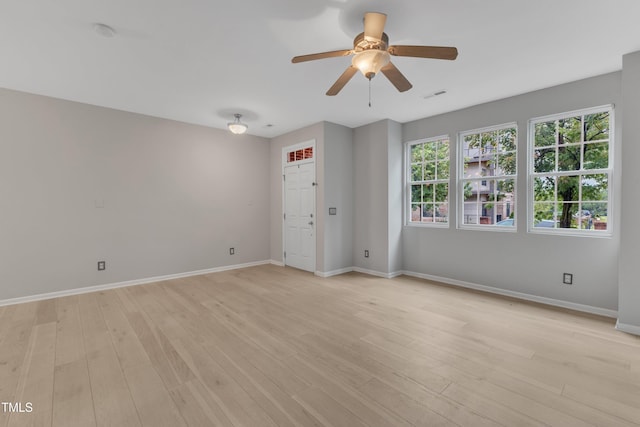 3634 Olympia Dr, Raleigh, NC 27603 - unfurnished room with light wood finished floors, ceiling fan, and a smoke detector