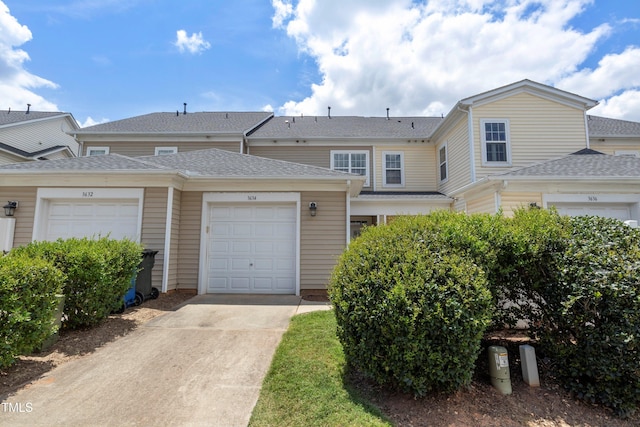 3634 Olympia Dr, Raleigh, NC 27603 - view of property with concrete driveway and roof with shingles
