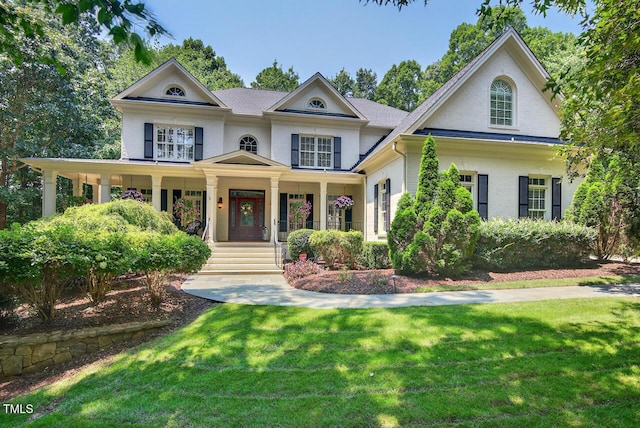 3748 Knollcreek Dr, Apex, NC 27539 - neoclassical / greek revival house with a front lawn and a porch