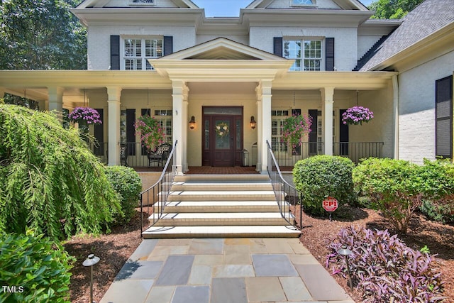 3748 Knollcreek Dr, Apex, NC 27539 - entrance to property featuring a porch and brick siding