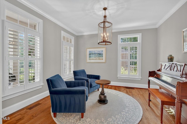 3748 Knollcreek Dr, Apex, NC 27539 - sitting room with crown molding and wood finished floors