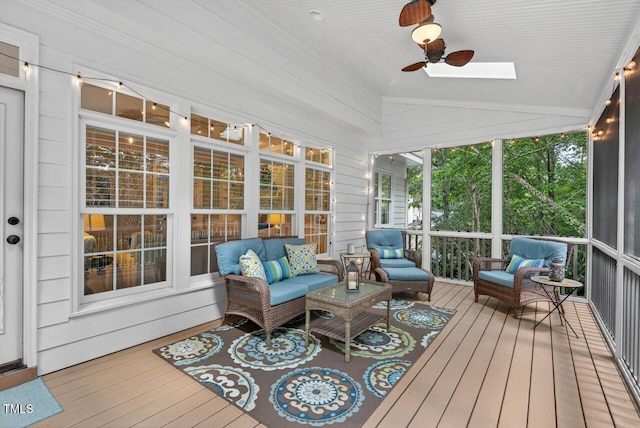 3748 Knollcreek Dr, Apex, NC 27539 - sunroom / solarium with outdoor lounge area, a ceiling fan, vaulted ceiling, and a skylight