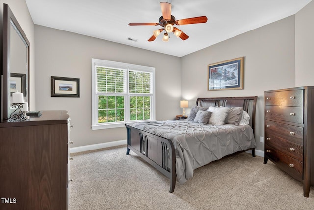 3748 Knollcreek Dr, Apex, NC 27539 - bedroom with light colored carpet and a ceiling fan