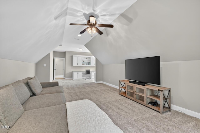 3748 Knollcreek Dr, Apex, NC 27539 - living room featuring a ceiling fan, vaulted ceiling, and carpet floors