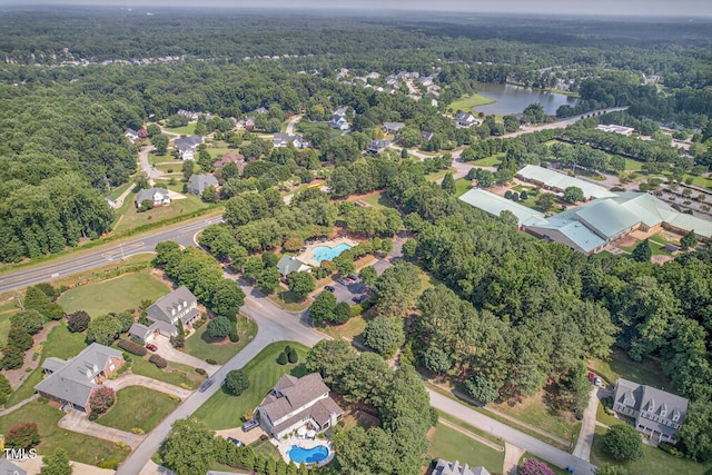 3748 Knollcreek Dr, Apex, NC 27539 - aerial view of property's location with a heavily wooded area and a nearby body of water
