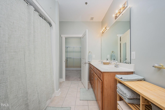 1535 Caraleigh Mills Ct Unit 142, Raleigh, NC 27603 - bathroom featuring tile patterned floors and double vanity