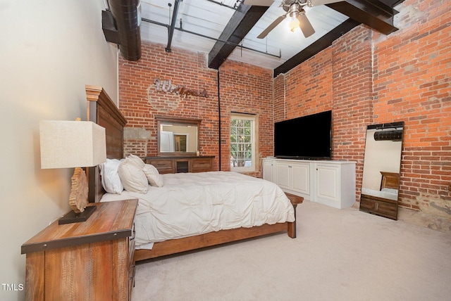 1535 Caraleigh Mills Ct Unit 142, Raleigh, NC 27603 - bedroom with brick wall, beam ceiling, a high ceiling, carpet flooring, and ceiling fan
