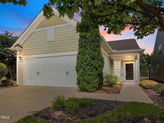 1704 Horne Creek Dr, Durham, NC 27703 - view of front of house featuring a garage and driveway