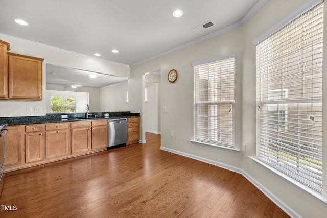 1704 Horne Creek Dr, Durham, NC 27703 - kitchen featuring stainless steel dishwasher, wood finished floors, crown molding, recessed lighting, and ceiling fan