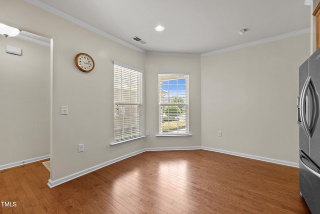 1704 Horne Creek Dr, Durham, NC 27703 - unfurnished room with wood finished floors, ornamental molding, and recessed lighting