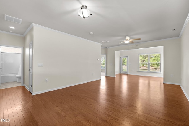 1704 Horne Creek Dr, Durham, NC 27703 - unfurnished living room with wood finished floors, a ceiling fan, and ornamental molding