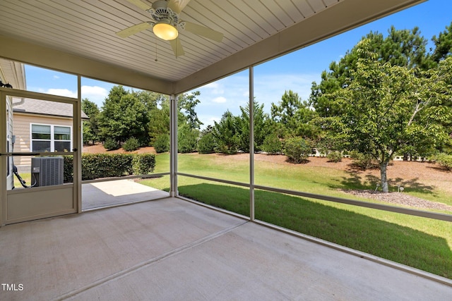 1704 Horne Creek Dr, Durham, NC 27703 - unfurnished sunroom featuring a ceiling fan and view of scattered trees