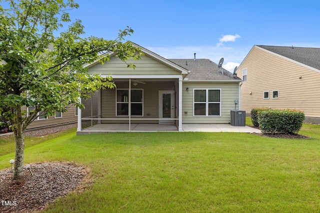 1704 Horne Creek Dr, Durham, NC 27703 - rear view of house with a patio area, a yard, and roof with shingles