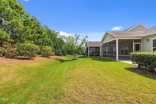 1704 Horne Creek Dr, Durham, NC 27703 - view of grassy yard featuring a sunroom