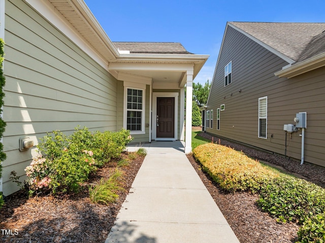 1704 Horne Creek Dr, Durham, NC 27703 - view of exterior entry with a shingled roof
