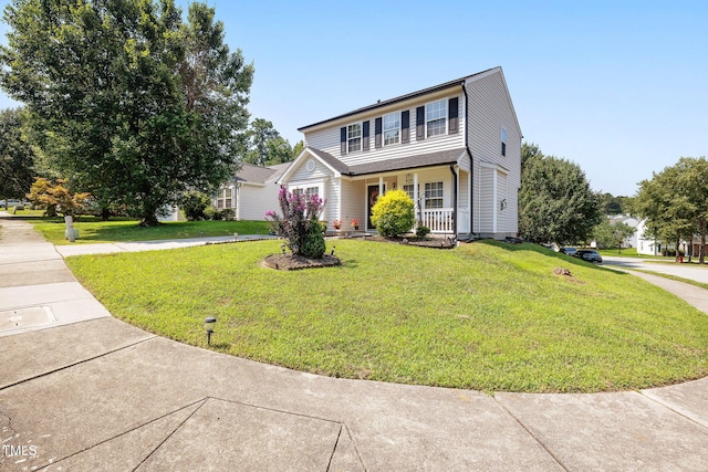 117 Gladstone Dr, Durham, NC 27703 - traditional home with a front yard and covered porch