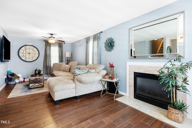 117 Gladstone Dr, Durham, NC 27703 - living room featuring wood finished floors, a ceiling fan, and a fireplace
