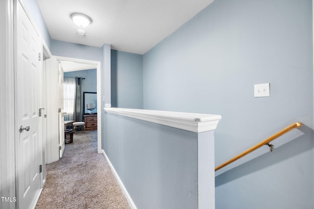117 Gladstone Dr, Durham, NC 27703 - hall with an upstairs landing and carpet flooring