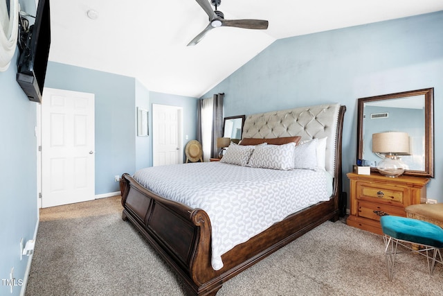 117 Gladstone Dr, Durham, NC 27703 - carpeted bedroom with vaulted ceiling and a ceiling fan