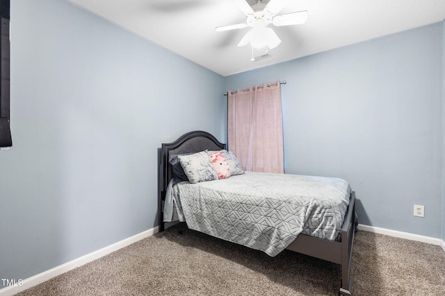 117 Gladstone Dr, Durham, NC 27703 - carpeted bedroom with baseboards and ceiling fan