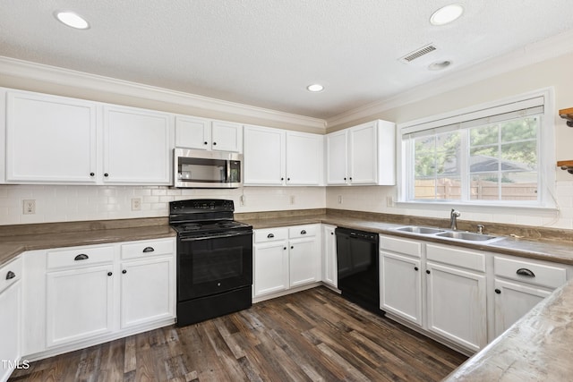 328 Palmdale Ct, Holly Springs, NC 27540 - kitchen featuring black appliances, crown molding, white cabinets, dark wood-type flooring, and decorative backsplash