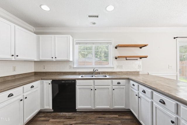 328 Palmdale Ct, Holly Springs, NC 27540 - kitchen featuring dishwasher, ornamental molding, plenty of natural light, white cabinetry, and a textured ceiling