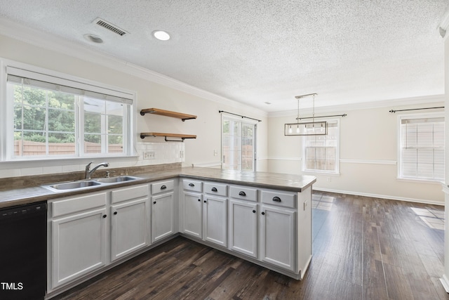 328 Palmdale Ct, Holly Springs, NC 27540 - kitchen with dishwasher, a textured ceiling, a peninsula, ornamental molding, and dark wood-style floors