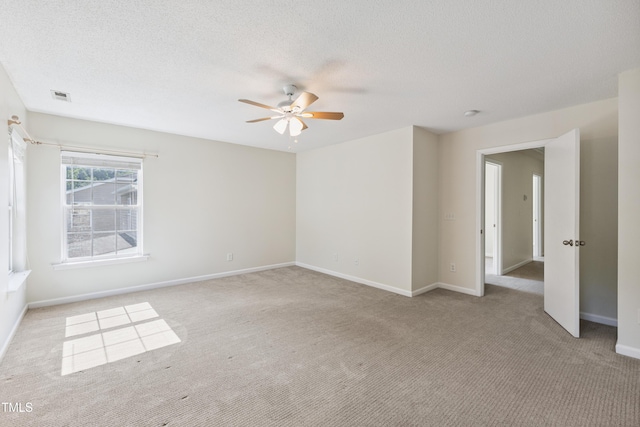 328 Palmdale Ct, Holly Springs, NC 27540 - carpeted spare room featuring ceiling fan and a textured ceiling