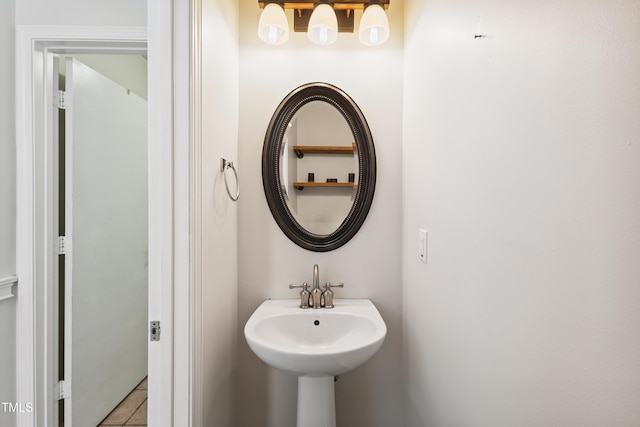 328 Palmdale Ct, Holly Springs, NC 27540 - bathroom featuring a sink and tile patterned flooring
