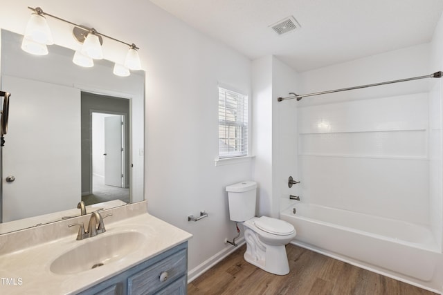 328 Palmdale Ct, Holly Springs, NC 27540 - bathroom featuring wood finished floors, vanity, and bathing tub / shower combination