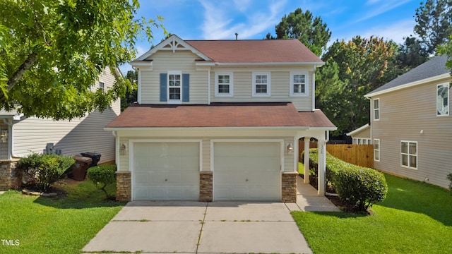 328 Palmdale Ct, Holly Springs, NC 27540 - view of front of property with concrete driveway, a garage, stone siding, and a shingled roof