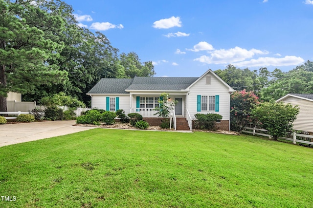 413 S Fayetteville St, Clayton, NC 27520 - view of front of home with a porch, driveway, and a shingled roof